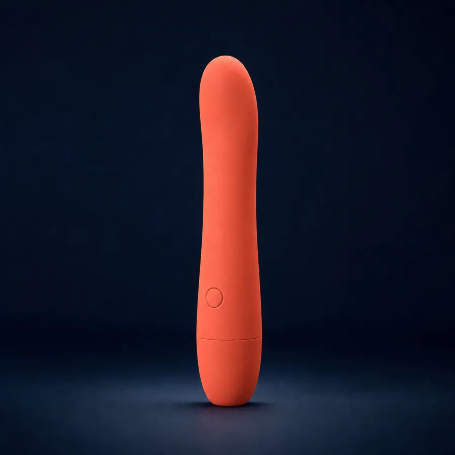 Coral slim personal massager on a navy background